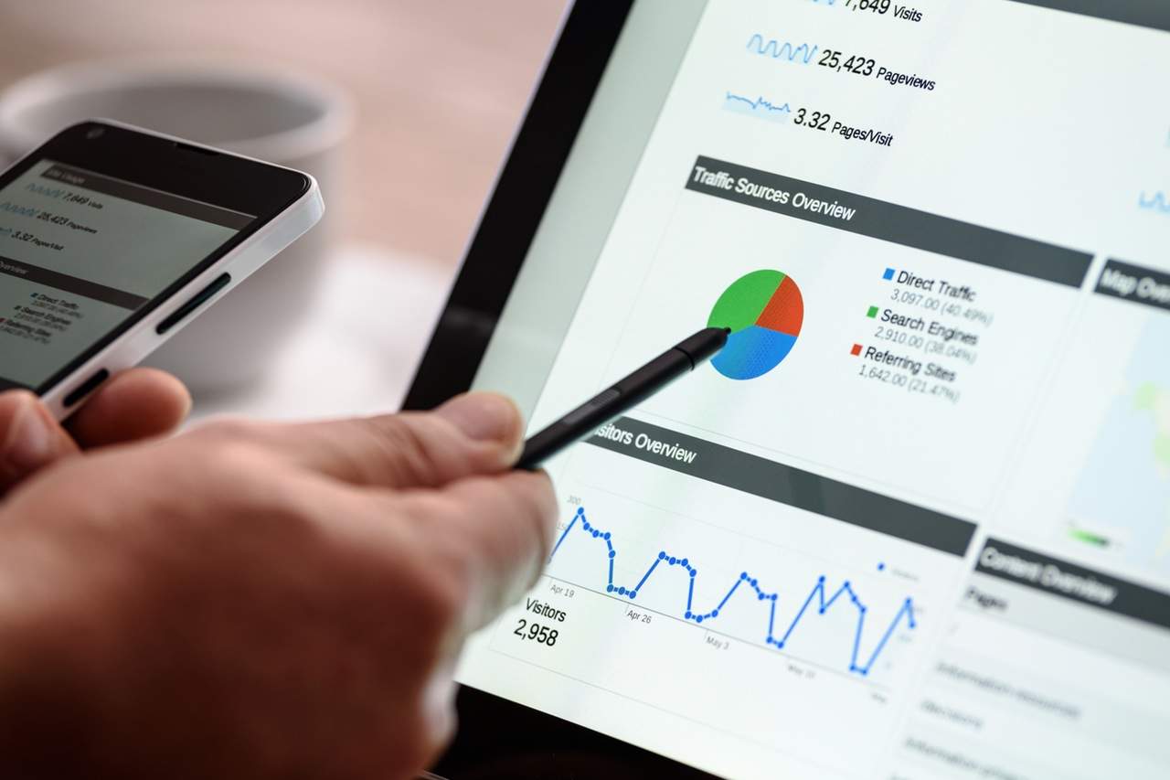 photo of a man holding a tablet pen