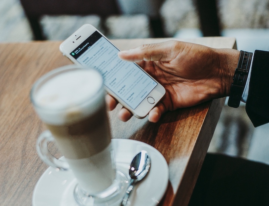 woman holding smartphone in her hand