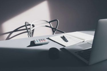 workspace of a journalist during sunset
