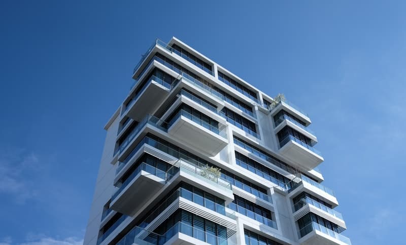 Beautiful modern apartment building against a blue sky