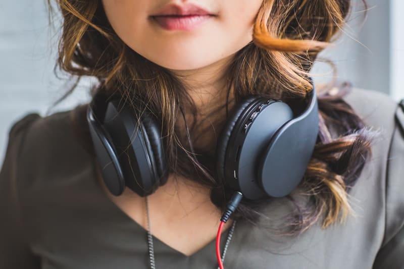 Female wearing monitor headphones