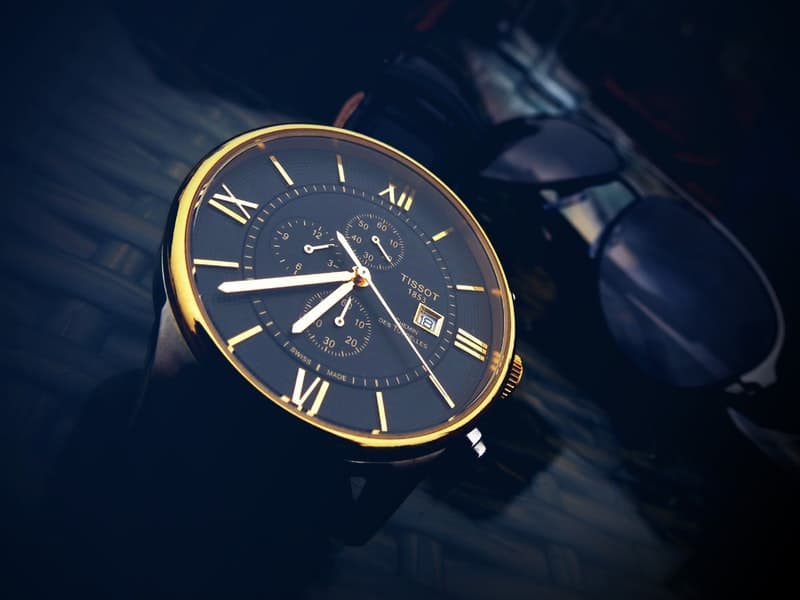 Round Gold-color Chronograph Watch With Black Strap