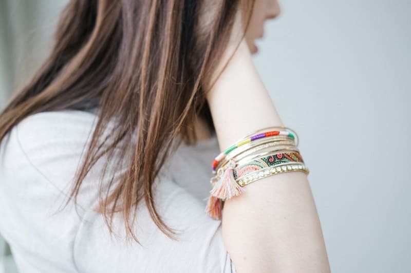 Young woman wearing pretty bracelets