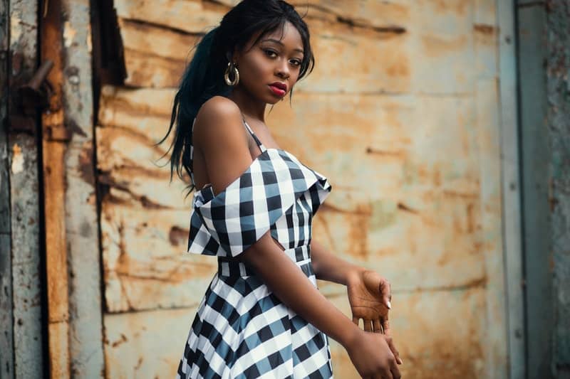 woman-wearing-white-and-black-plaid-cold-shoulder-dress