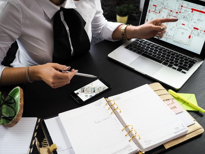 Business woman going over a project with a client