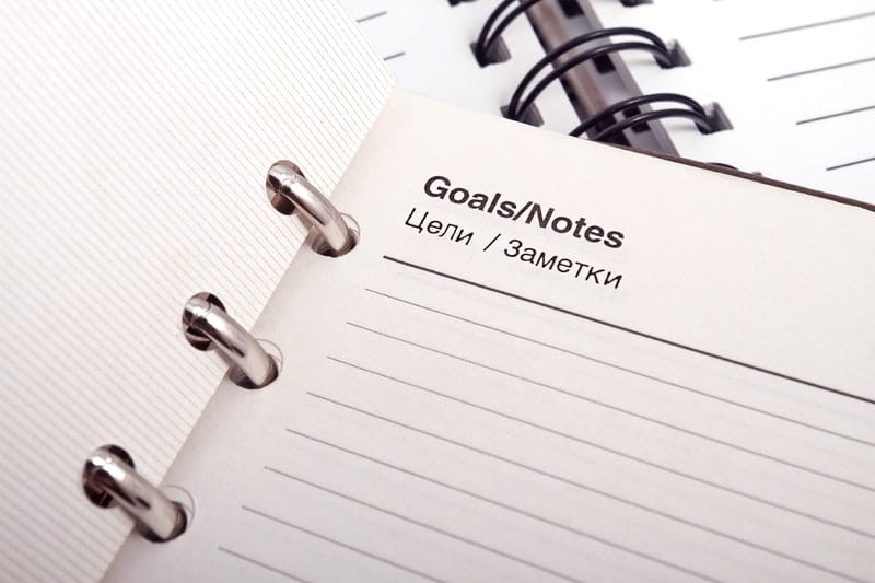 Close up of goals notebook