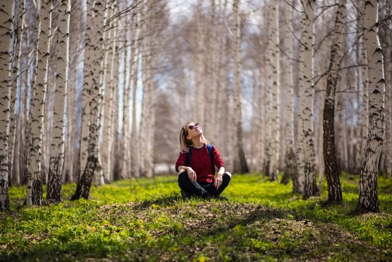 young woman chilling in the countryside