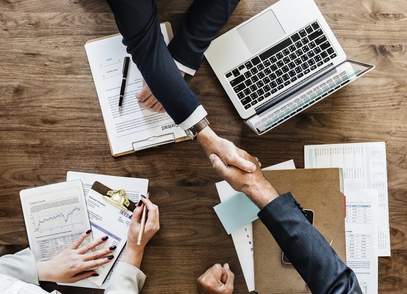 two businessmen shaking hands