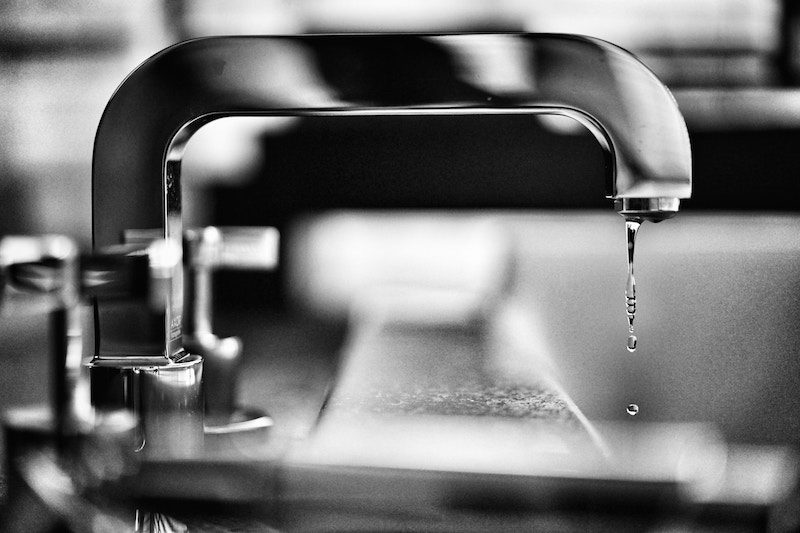 Futuristic faucet in black and white
