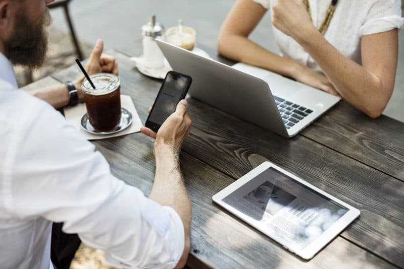 group of adults having a businees meeting during brunch