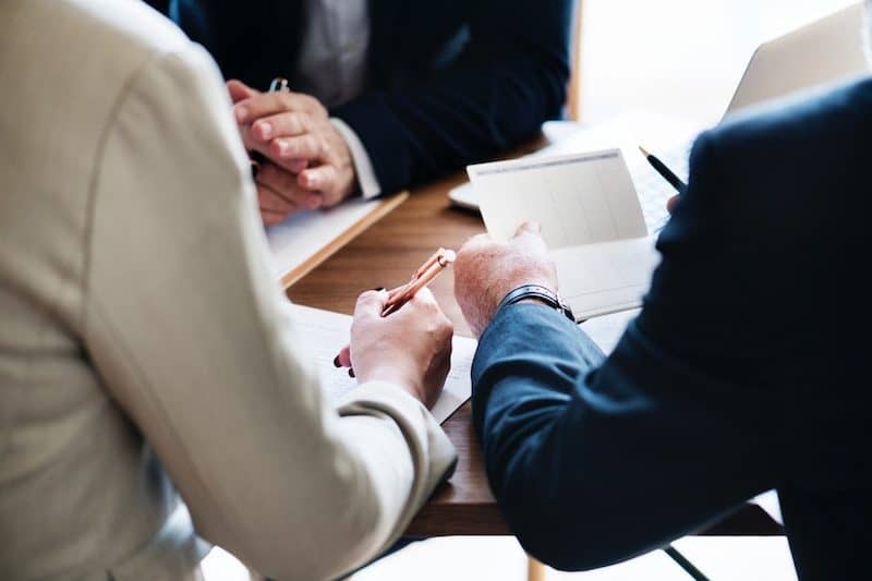 Bank Employees working on giving a loan