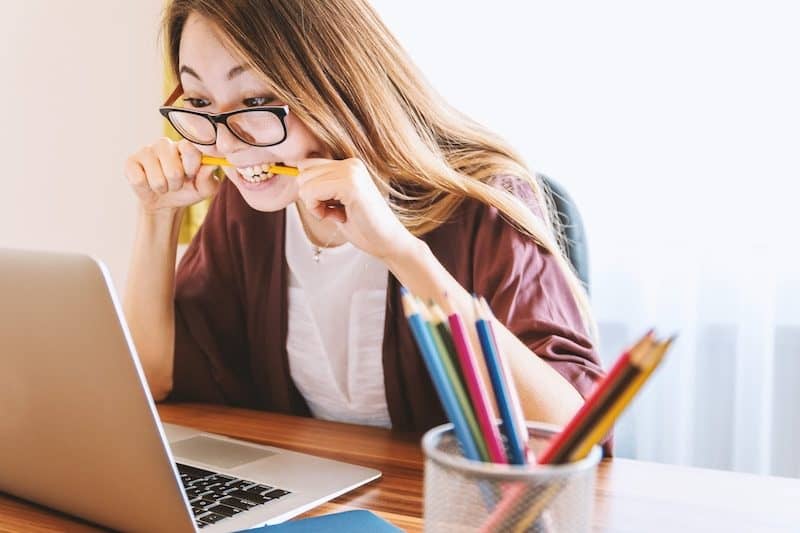 Asian Woman Stressed About Website