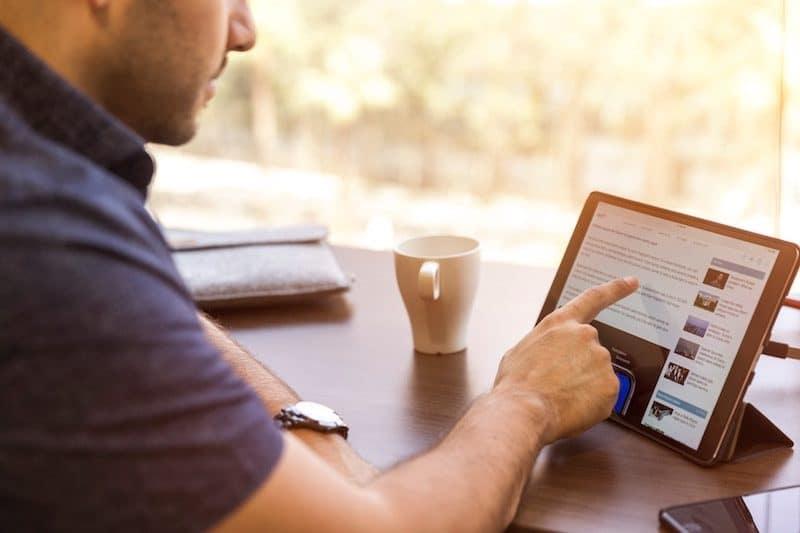 Man Using an iPad at Work