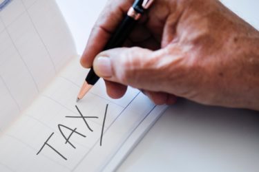 Small Business Owner Doing His Taxes