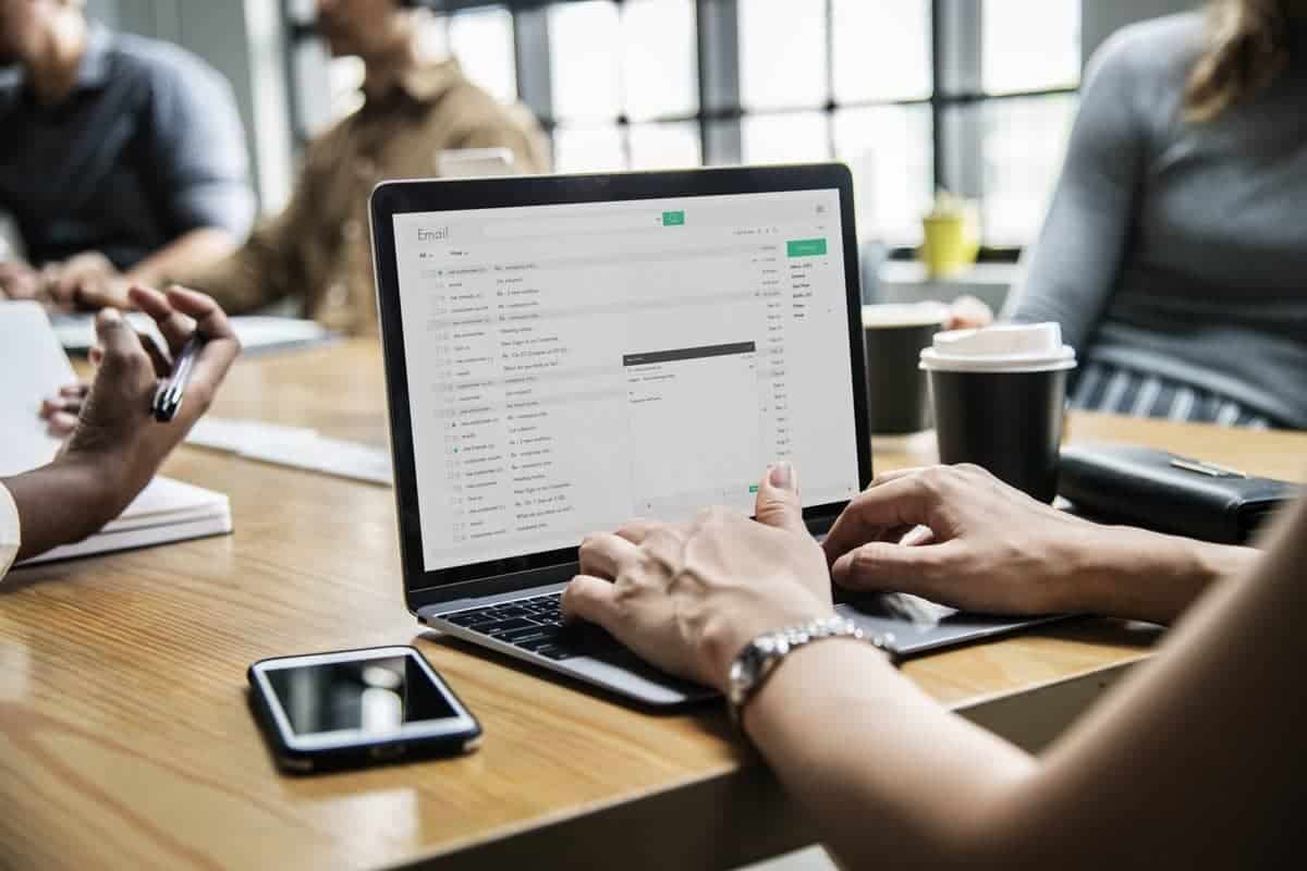 Woman answering emails at the office