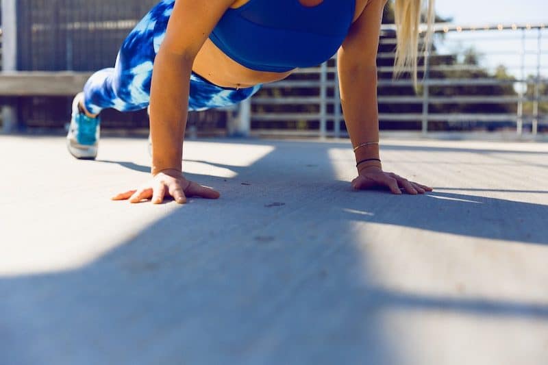 Woman is doing a push up