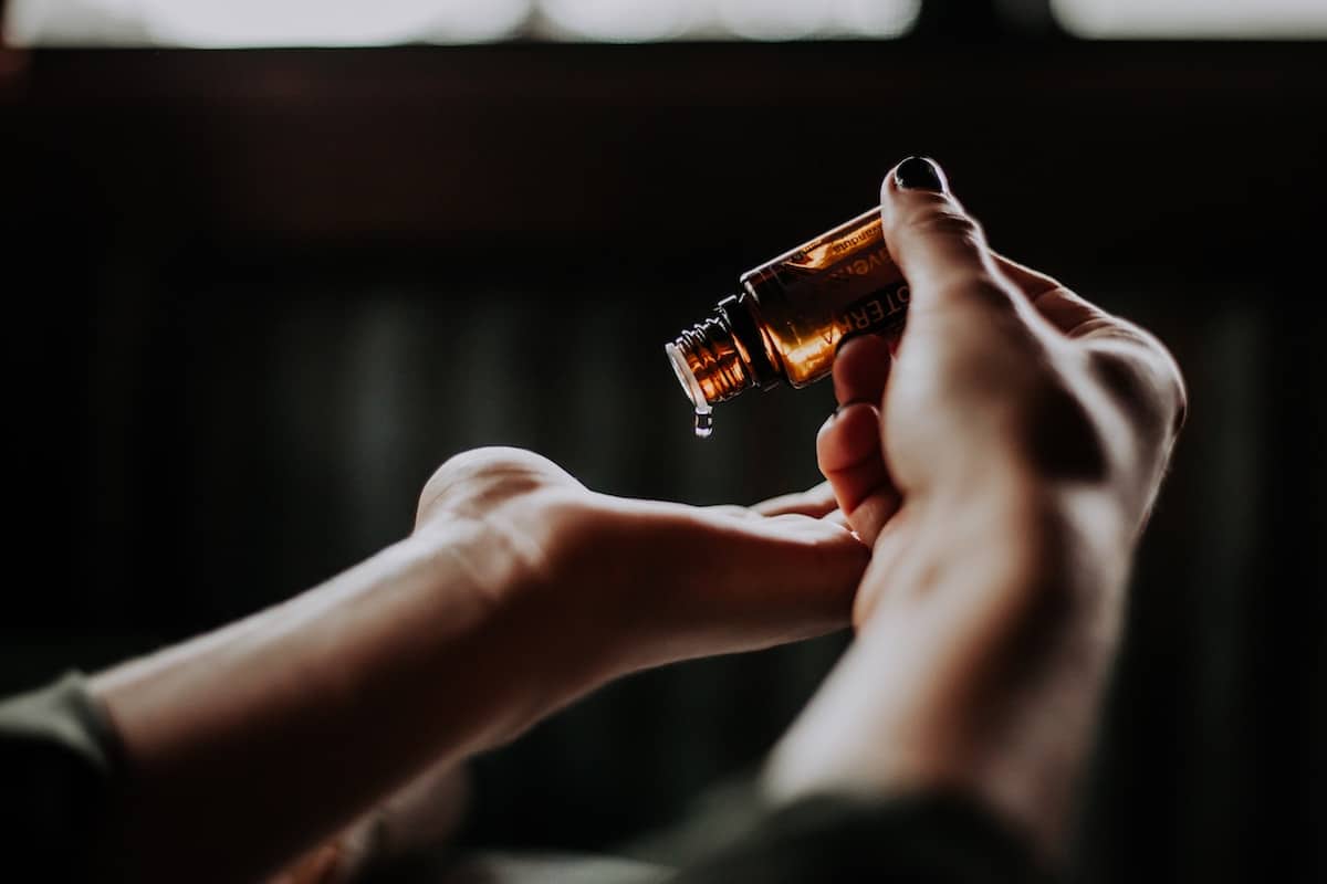 Woman pouring CBD Oil