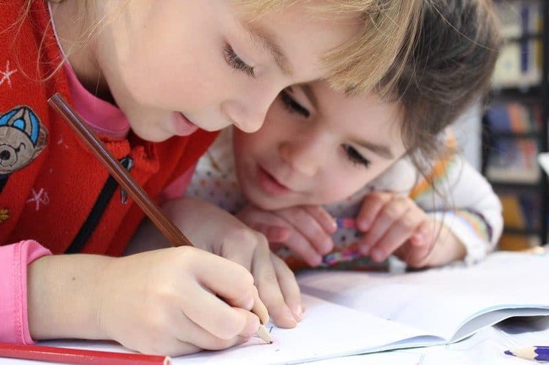 two girls learning