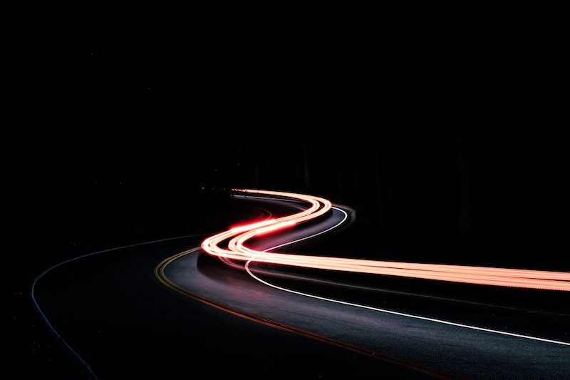 car light trails in the mountains