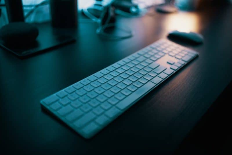 apple magic keyboard with soft light shining on it