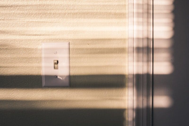 white wall light switch