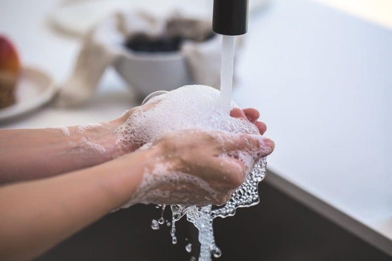 woman washing her hands