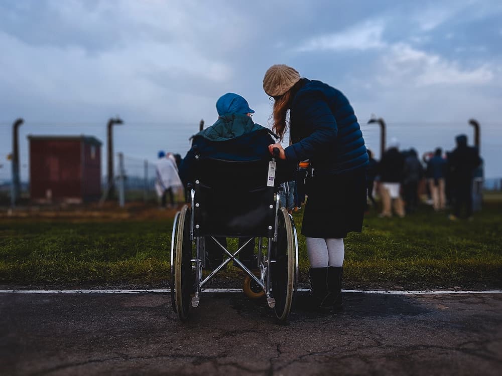 Daughter with her mother in a wheelchair