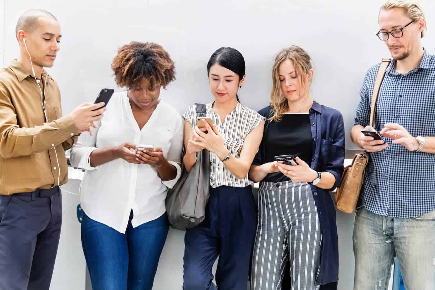 Group of people using their cell phones