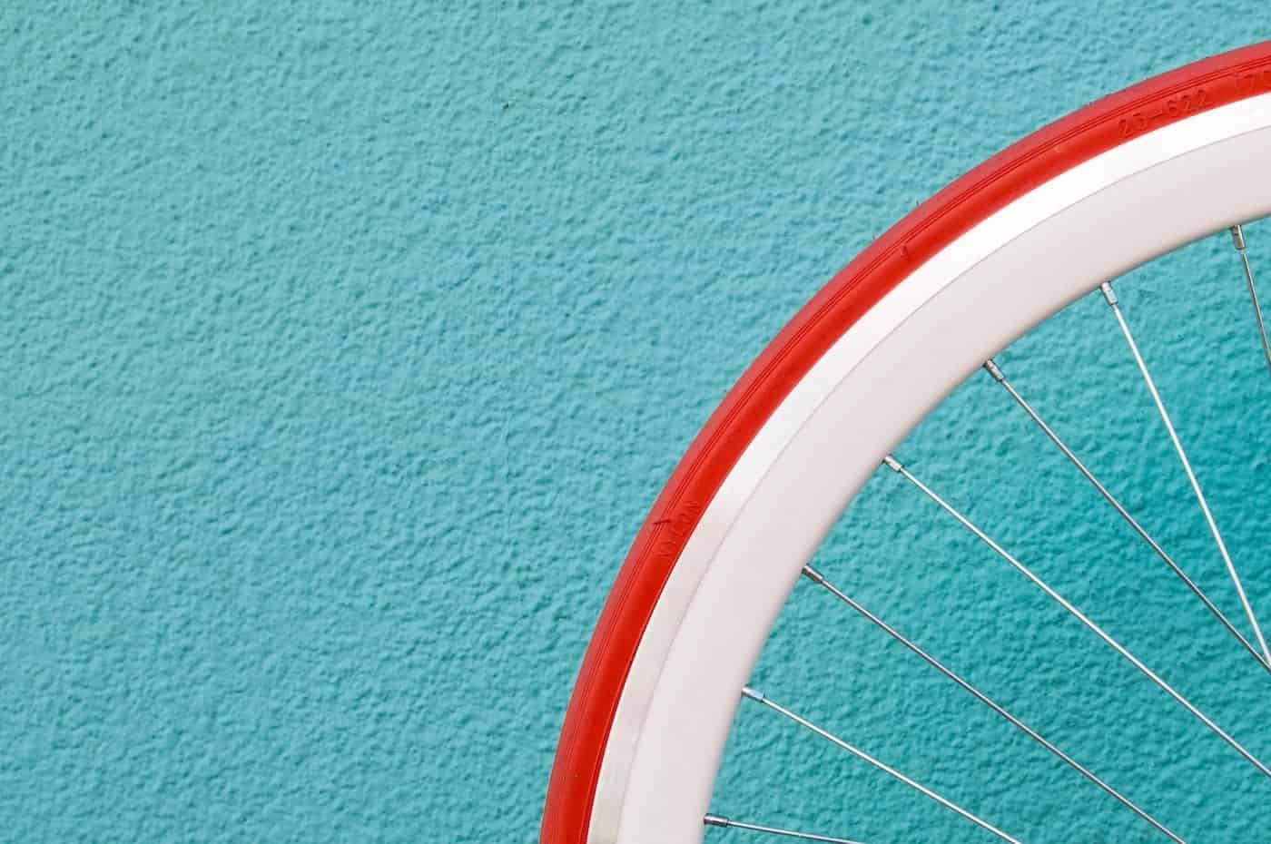 Minimal bike tire against a blue background