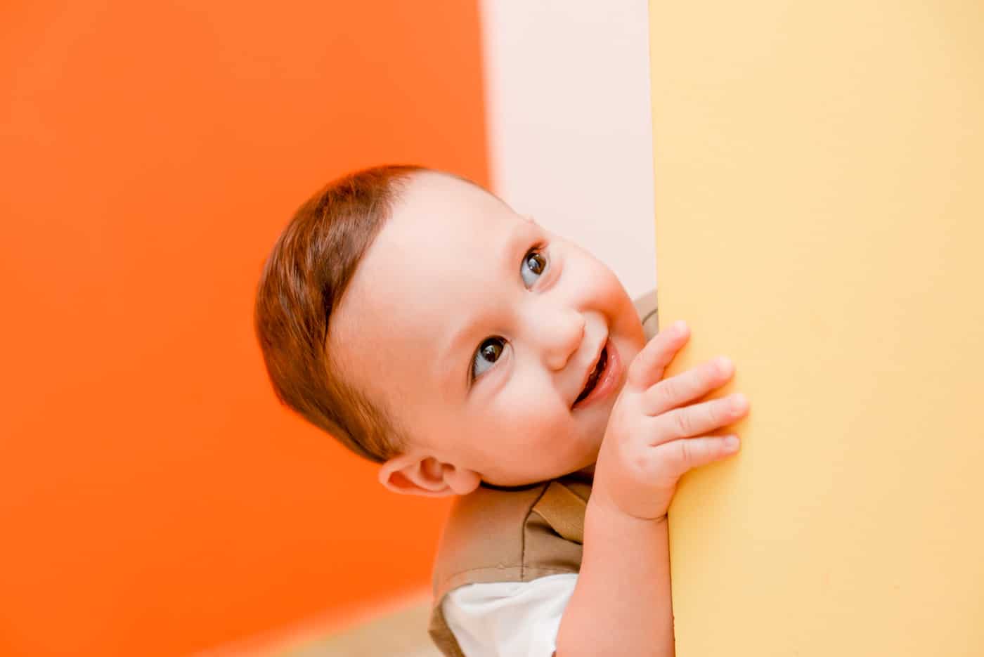 Cute Kid Peeking Around the Corner