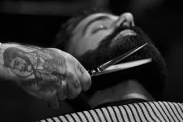 Man Getting His Beard Shaved
