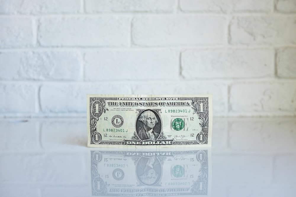 1dollar banknote on white surface