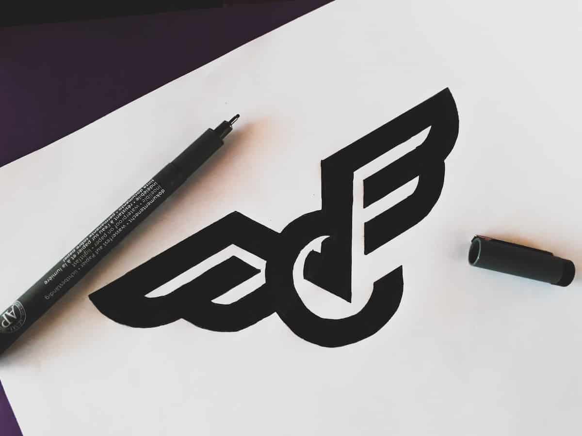 Logo Sketch Idea Inside a Notebook