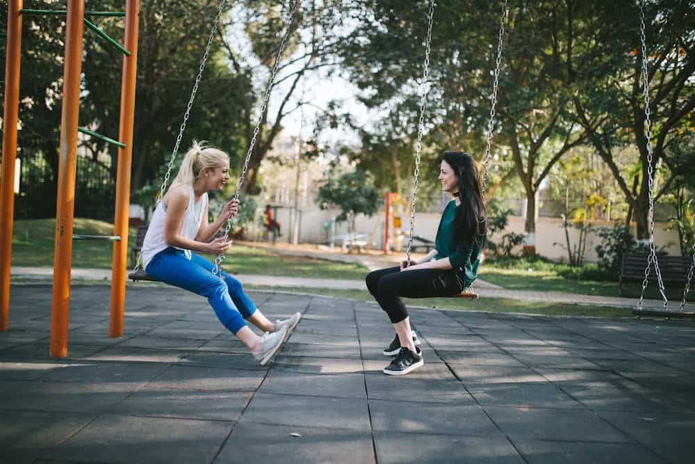 women talking at the park