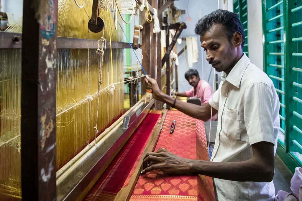 guy making silk sarong