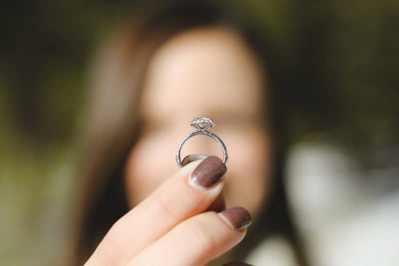 women holding a ring