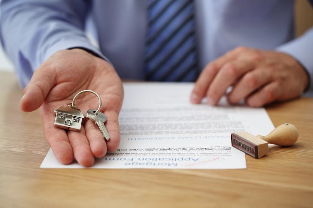 guy holding the keys