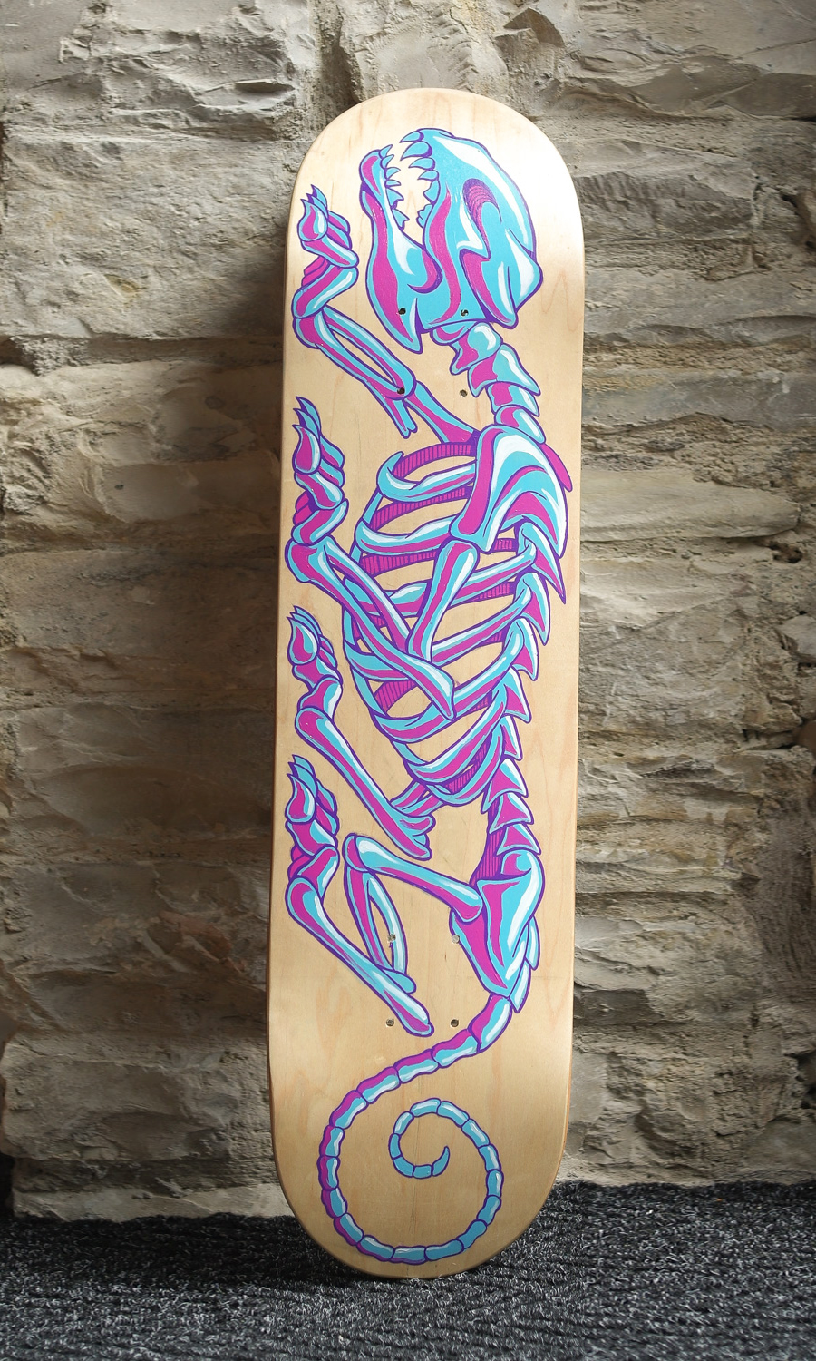 Dog Skull skateboard deck by Chad Woodward from Red Central