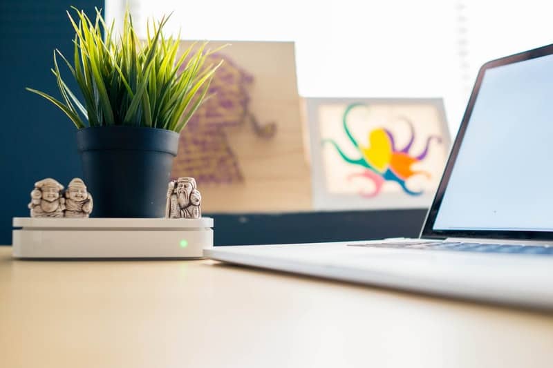 wireless router with cute mini statues on top