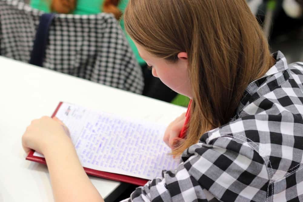 Woman working on her essay