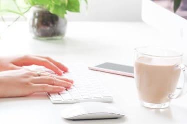 Woman creating a PDF file on her desktop computer