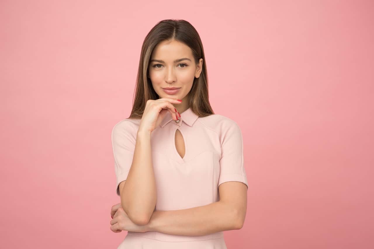 Beautiful woman wearing a pink dress