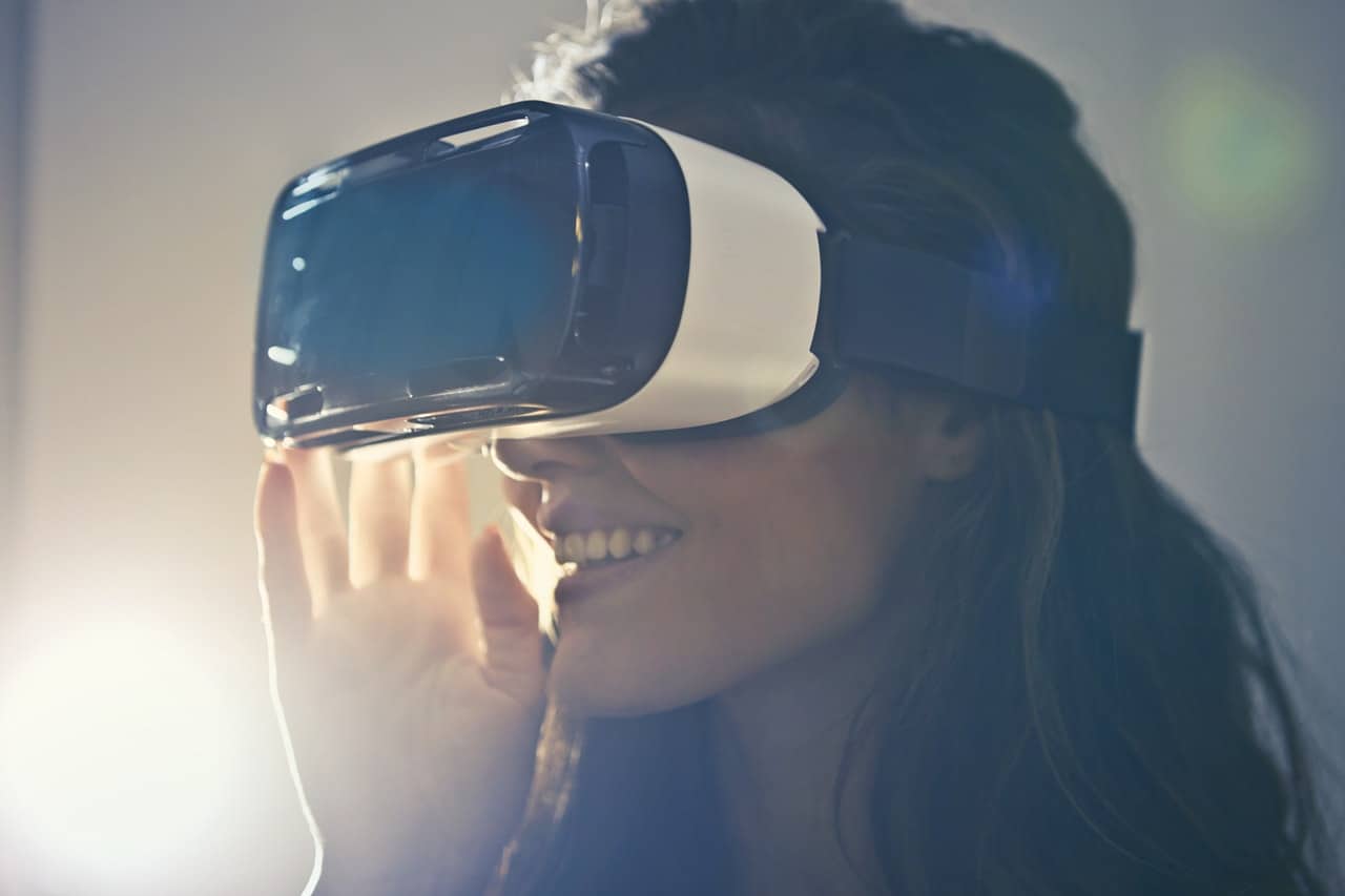 woman wearing virtual reality goggles