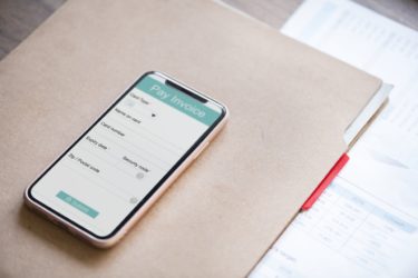 smartphone on top of a business table