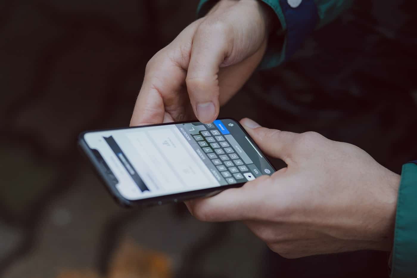 Man Using a Smartphone to Text