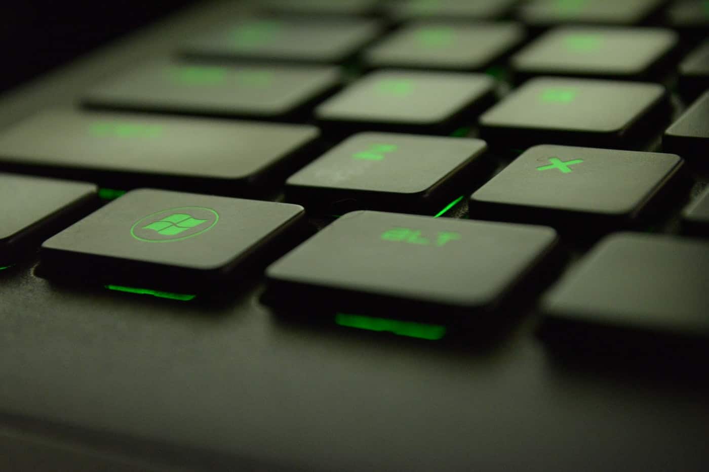 Windows Button on a Backlit Green Keyboard
