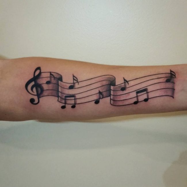 65 Brilliant Music Notes Tattoos On Neck