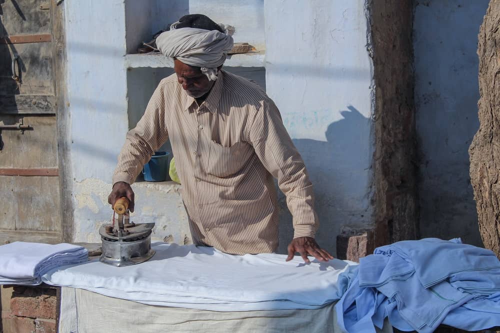 Indian Man Ironing