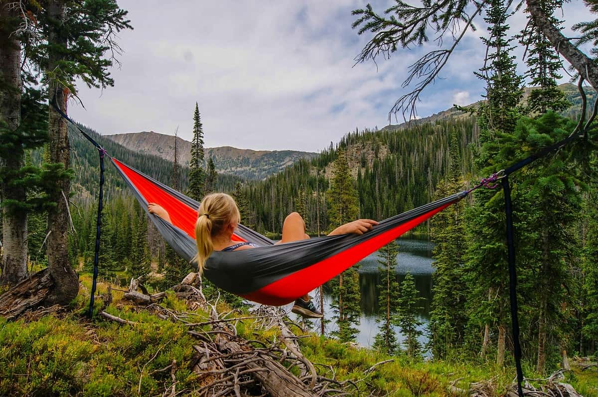 Woman Enjoying a Stunning Mountain View