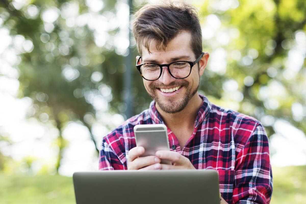 Young Man Using Tinder to Find Women